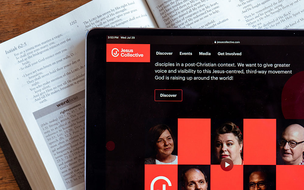 Jesus Collective website on a Bible
